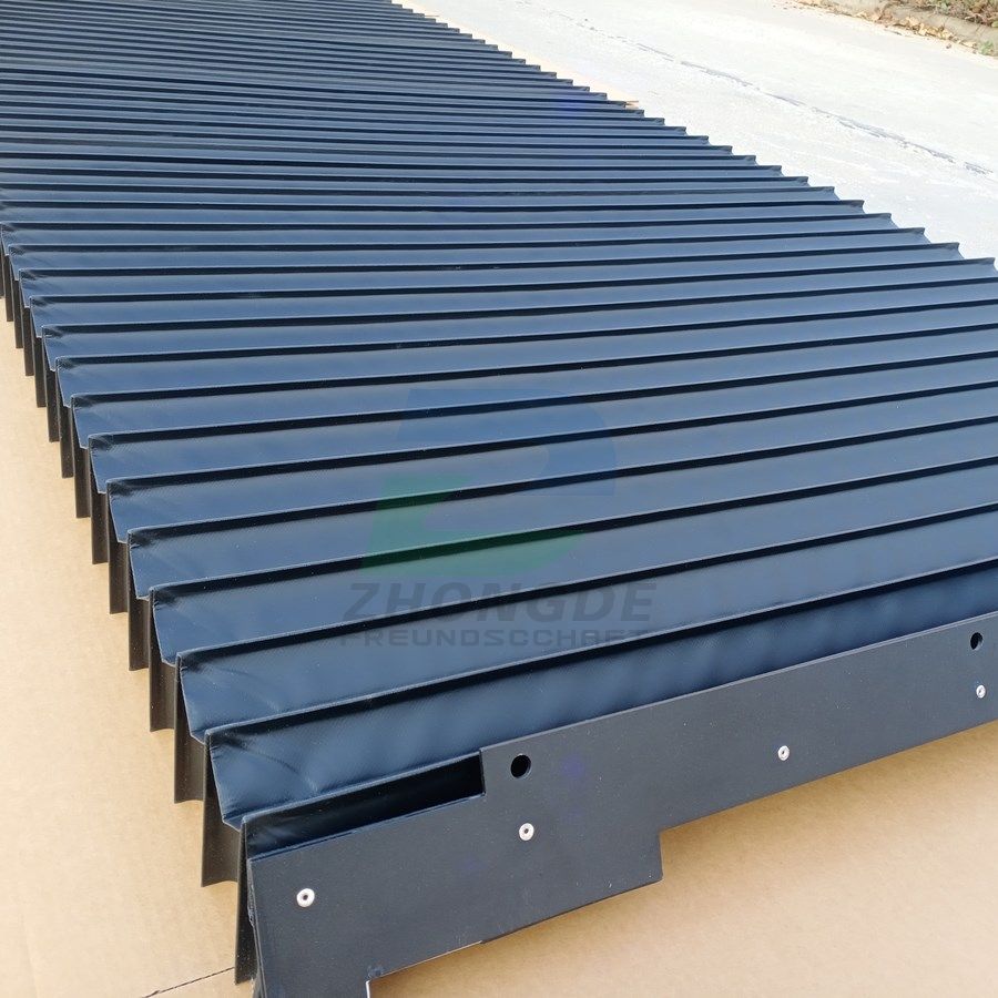 Retractable fabric bellows linear guide cover.